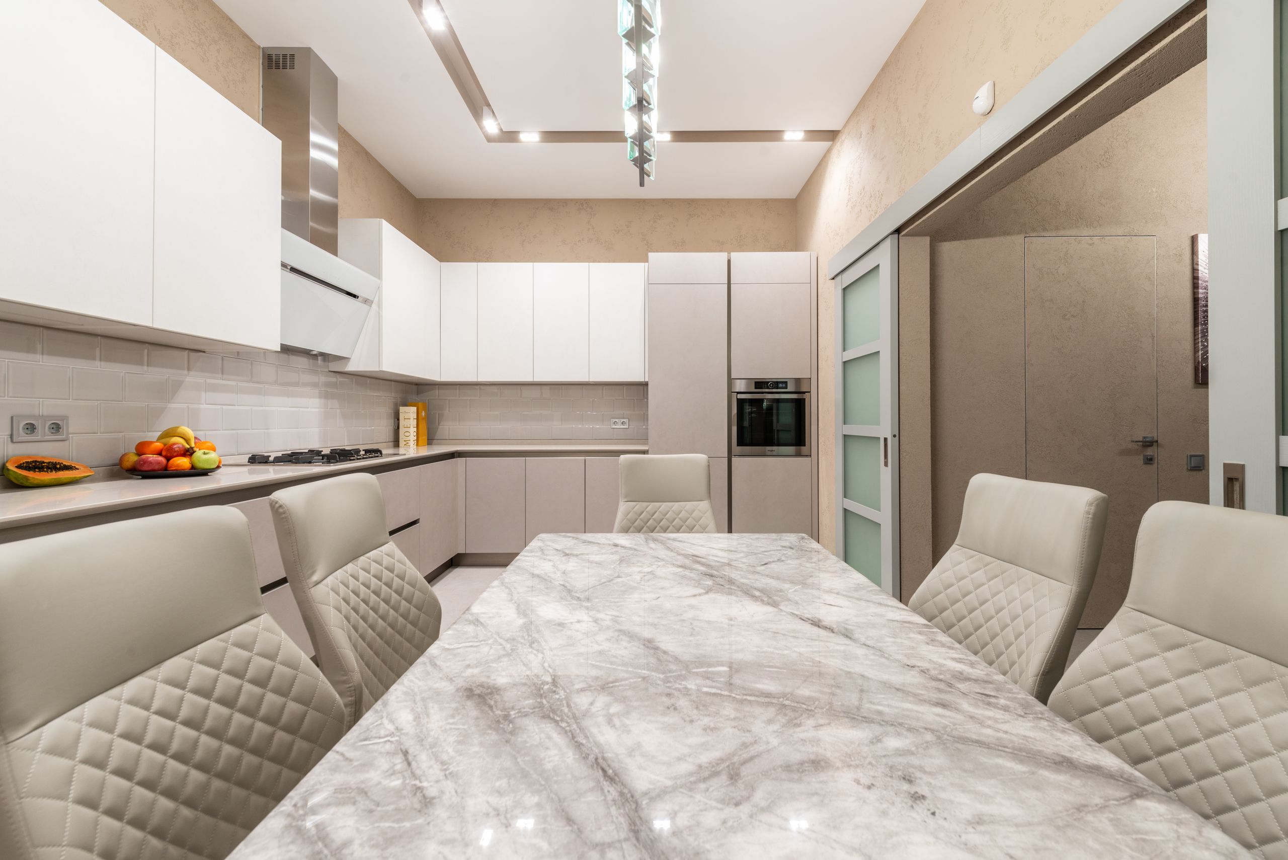 Calacatta kitchen with a book-matched island